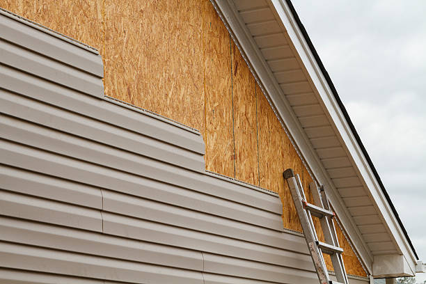Professional Siding Contractor technician working in Ashland, MA